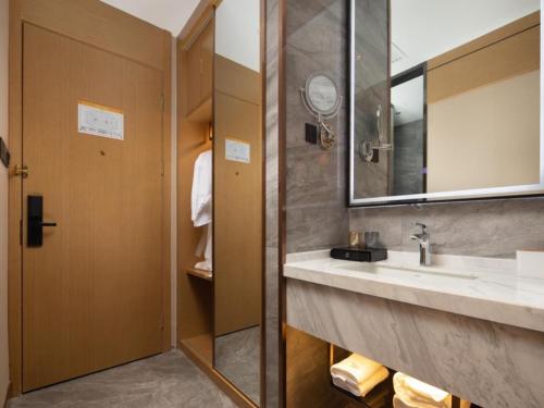 Imagen de la habitación del Hotel GreenTree Eastern Tianjin Wuqing Wanda Plaza. Foto 20