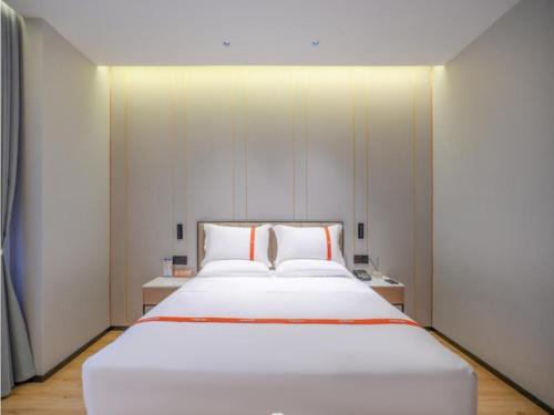 Imagen de la habitación del Hotel GreenTree Eastern Xinjiang Urumqi Xintianrun Airport. Foto 17