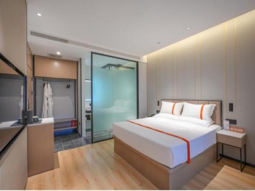 Imagen de la habitación del Hotel GreenTree Eastern Xinjiang Urumqi Xintianrun Airport. Foto 19