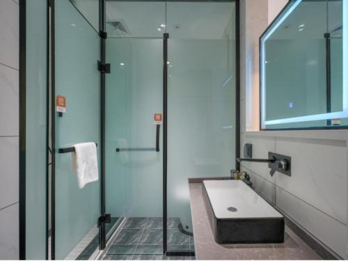 Imagen de la habitación del Hotel GreenTree Eastern Xinjiang Urumqi Xintianrun Airport. Foto 20