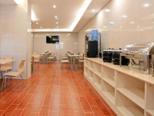 Imagen general del Hotel GreenTree Inn Anqing Duxiu Avenue Greenland Metropolis Express. Foto 3