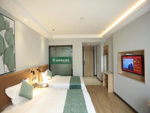 Imagen de la habitación del Hotel GreenTree Inn Anqing East Yingbin Road High-Speed Railway Station. Foto 17