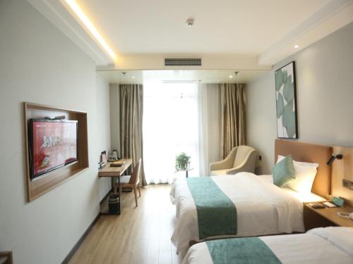 Imagen de la habitación del Hotel GreenTree Inn Anqing East Yingbin Road High-Speed Railway Station. Foto 20