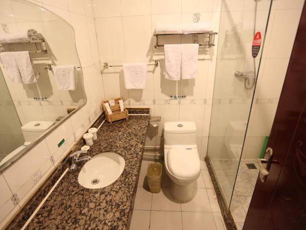 Imagen de la habitación del Hotel GreenTree Inn Binzhou Bus Station Hotel. Foto 4