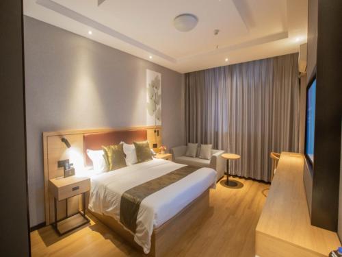 Imagen de la habitación del Hotel GreenTree Inn Express Changzhou Caoqiao Industrial Park. Foto 10