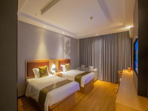 Imagen de la habitación del Hotel GreenTree Inn Express Changzhou Caoqiao Industrial Park. Foto 11
