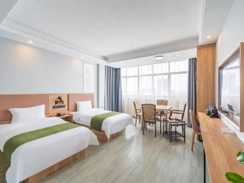 Imagen de la habitación del Hotel GreenTree Inn Express Changzhou Caoqiao Industrial Park. Foto 12