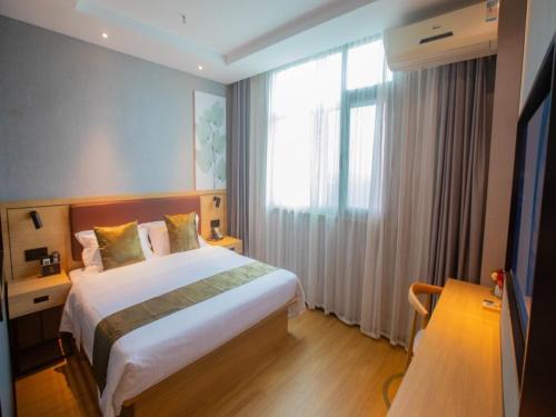 Imagen de la habitación del Hotel GreenTree Inn Express Changzhou Caoqiao Industrial Park. Foto 13