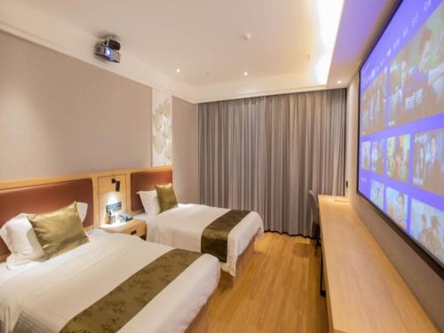 Imagen de la habitación del Hotel GreenTree Inn Express Changzhou Caoqiao Industrial Park. Foto 16