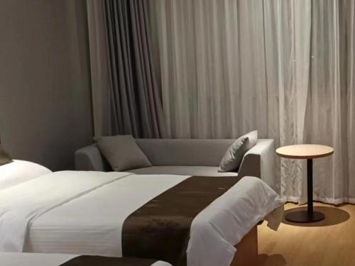Imagen de la habitación del Hotel GreenTree Inn Express Changzhou Caoqiao Industrial Park. Foto 17