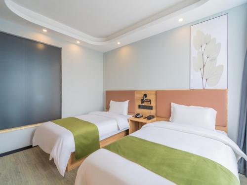 Imagen de la habitación del Hotel GreenTree Inn Express Changzhou Caoqiao Industrial Park. Foto 19