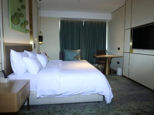 Imagen general del Hotel GreenTree Inn Express Changzhou Wujin Economic Development Zone Qishuyan Yaoguan. Foto 1