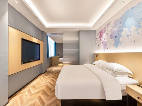 Imagen de la habitación del Hotel GreenTree Inn Express Changzhou Wujin Economic Development Zone Qishuyan Yaoguan. Foto 12