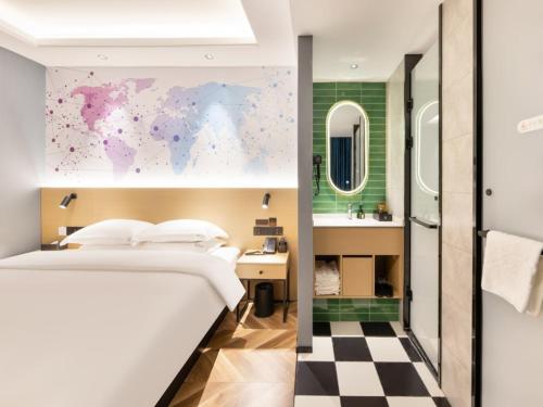 Imagen de la habitación del Hotel GreenTree Inn Express Changzhou Wujin Economic Development Zone Qishuyan Yaoguan. Foto 15