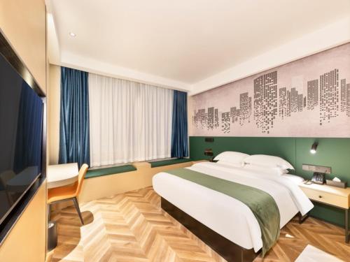Imagen de la habitación del Hotel GreenTree Inn Express Changzhou Wujin Economic Development Zone Qishuyan Yaoguan. Foto 17
