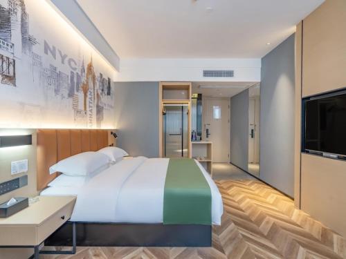 Imagen de la habitación del Hotel GreenTree Inn Express Changzhou Wujin Economic Development Zone Qishuyan Yaoguan. Foto 20