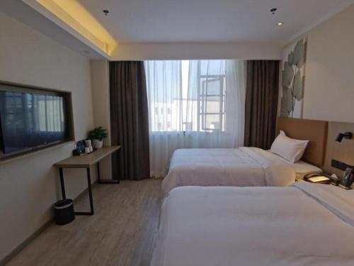 Imagen general del Hotel GreenTree Inn Express Fuzhou Linchuan District Gandong Auto City. Foto 10