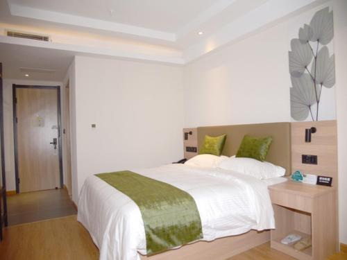 Imagen de la habitación del Hotel GreenTree Inn Express Heyuan N1 High Fountain. Foto 14