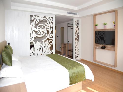 Imagen de la habitación del Hotel GreenTree Inn Express Heyuan N1 High Fountain. Foto 16