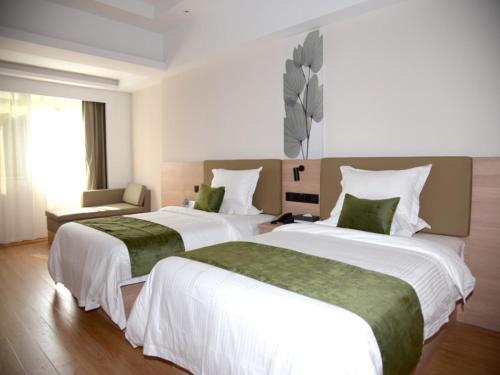 Imagen de la habitación del Hotel GreenTree Inn Express Heyuan N1 High Fountain. Foto 18