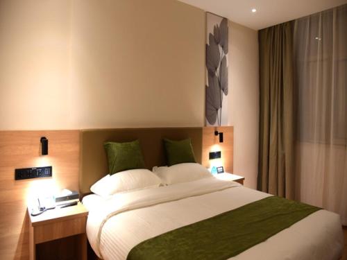 Imagen de la habitación del Hotel GreenTree Inn Express Heyuan N1 High Fountain. Foto 19