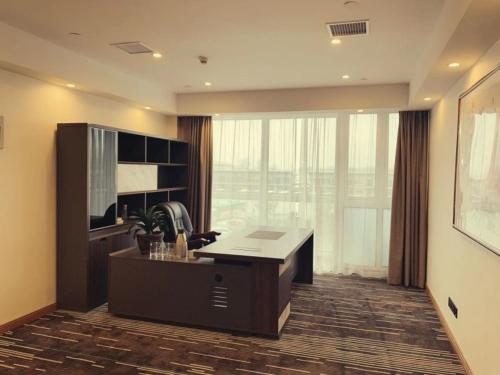 Imagen de la habitación del Hotel GreenTree Inn Express Jiangsu Suqian Shuyang Bus Station. Foto 14