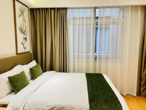 Imagen de la habitación del Hotel GreenTree Inn Express Jiangsu Suqian Shuyang Bus Station. Foto 16