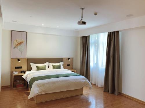 Imagen de la habitación del Hotel GreenTree Inn Express Jiangsu Suqian Shuyang Bus Station. Foto 17
