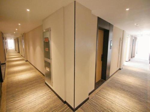 Imagen general del Hotel GreenTree Inn Express Suzhou Tai Lake Xukou Huadun Metro Station. Foto 7