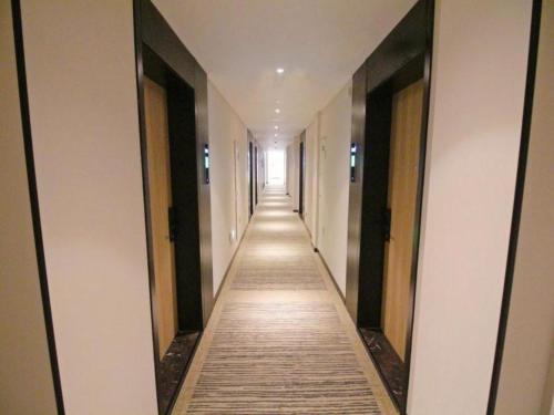 Imagen general del Hotel GreenTree Inn Express Suzhou Tai Lake Xukou Huadun Metro Station. Foto 8