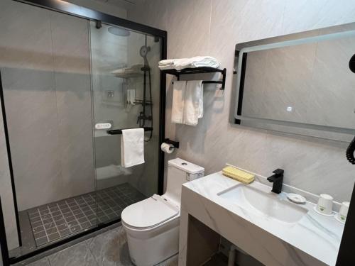 Imagen de la habitación del Hotel GreenTree Inn Express Suzhou Taicang West Nanjing Road. Foto 15