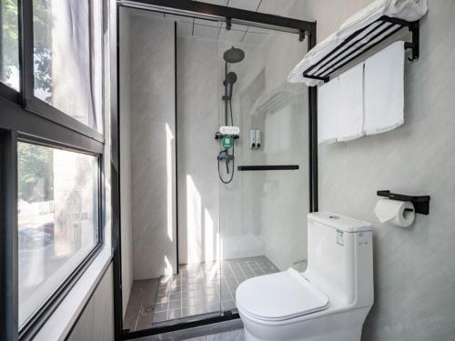 Imagen general del Hotel GreenTree Inn Express Suzhou Taicang West Nanjing Road. Foto 8