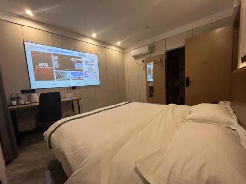 Imagen general del Hotel GreenTree Inn Express Suzhou Taicang West Nanjing Road. Foto 12