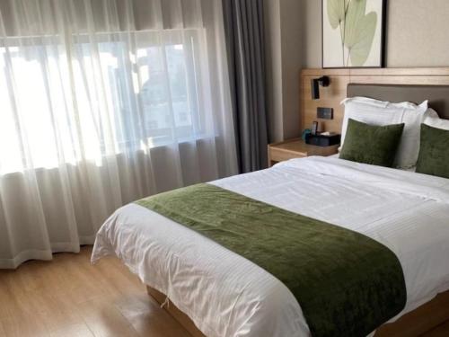 Imagen general del Hotel GreenTree Inn Express Suzhou Zhangjianggang Free Trade Zone Central Plaza. Foto 1