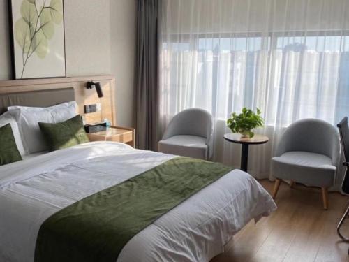 Imagen general del Hotel GreenTree Inn Express Suzhou Zhangjianggang Free Trade Zone Central Plaza. Foto 2