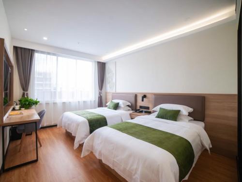 Imagen general del Hotel GreenTree Inn Express Suzhou Zhangjianggang Free Trade Zone Central Plaza. Foto 3