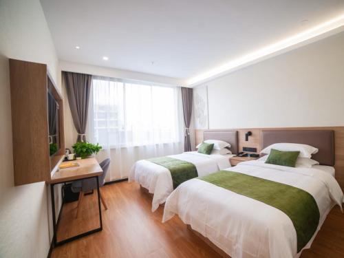 Imagen general del Hotel GreenTree Inn Express Suzhou Zhangjianggang Free Trade Zone Central Plaza. Foto 5