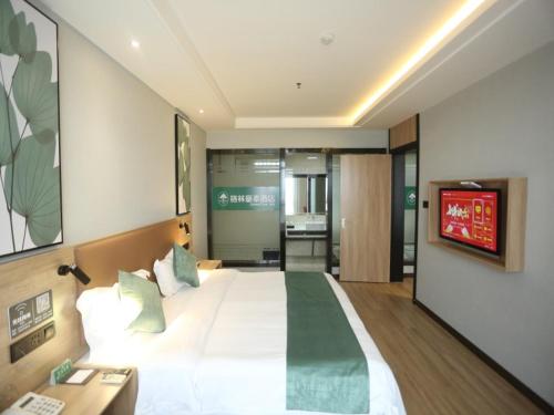 Imagen de la habitación del Hotel GreenTree Inn Express Tianjin Jinnan National Convention and Exhibition Center. Foto 14