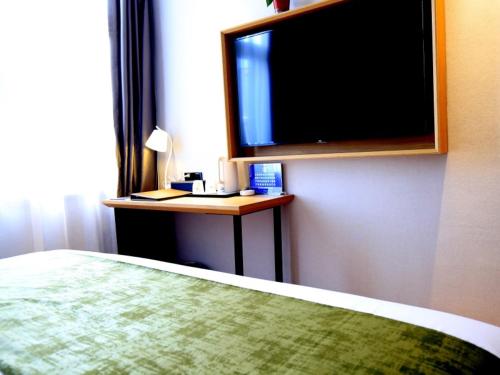 Imagen de la habitación del Hotel GreenTree Inn Express Tianjin Jinnan National Convention and Exhibition Center. Foto 15