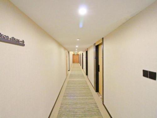 Imagen general del Hotel GreenTree Inn Express Zhangjiagang Hexing Town Shazhou Professional Institue of Technology. Foto 15