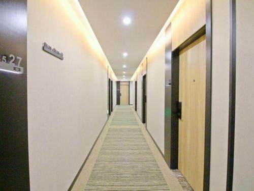Imagen general del Hotel GreenTree Inn Express Zhangjiagang Hexing Town Shazhou Professional Institue of Technology. Foto 16