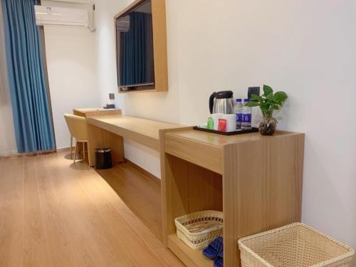 Imagen general del Hotel GreenTree Inn Guangdong Zhanjiang Donghai Island. Foto 2