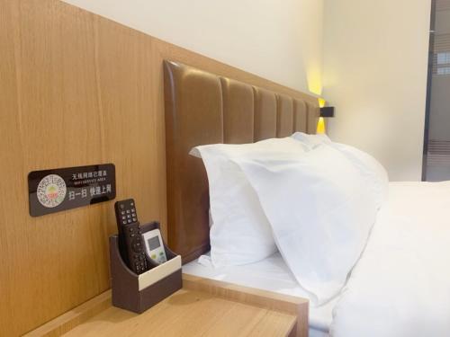 Imagen de la habitación del Hotel GreenTree Inn Guangdong Zhanjiang Donghai Island. Foto 17