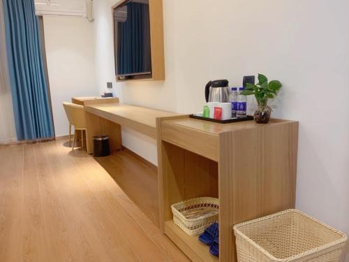 Imagen general del Hotel GreenTree Inn Guangdong Zhanjiang Donghai Island. Foto 9