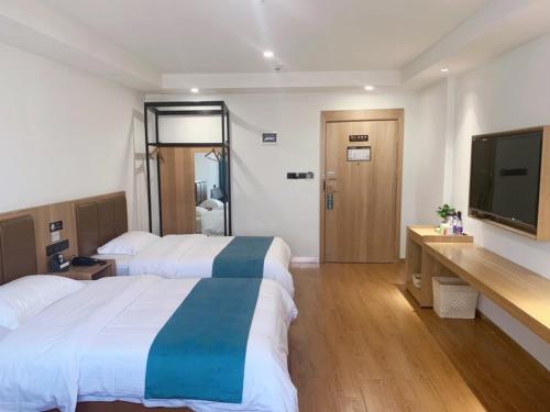 Imagen general del Hotel GreenTree Inn Guangdong Zhanjiang Donghai Island. Foto 12