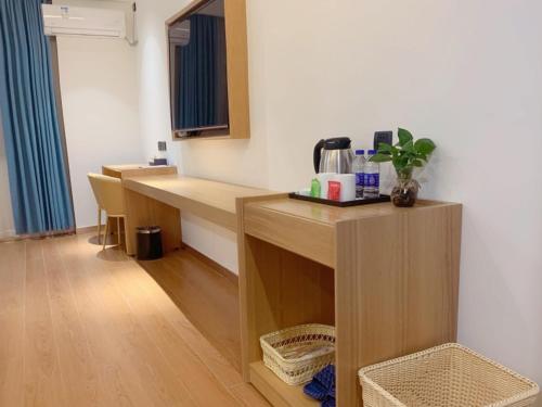 Imagen general del Hotel GreenTree Inn Guangdong Zhanjiang Donghai Island. Foto 16