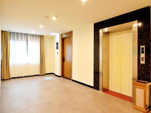 Imagen general del Hotel GreenTree Inn Haikou City Wuzhishan Road. Foto 11
