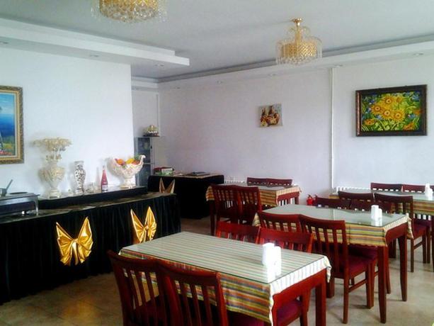 Imagen del bar/restaurante del Hotel GreenTree Inn Harbin Central Avenue. Foto 4