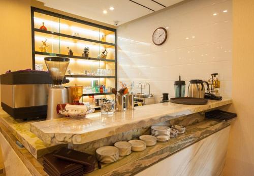 Imagen de la habitación del Hotel GreenTree Inn Jiangsu Nantong Haimen Sanchang North Wangjiang Road Business Hotel. Foto 8