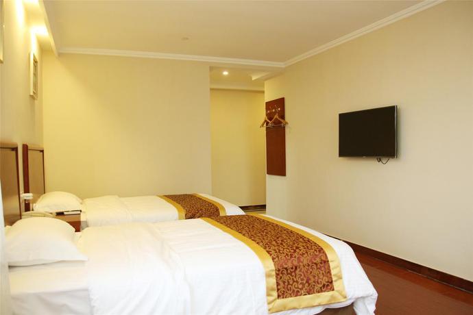 Imagen de la habitación del Hotel GreenTree Inn Jiangsu Suzhou Kunshan Shimao Plaza. Foto 11